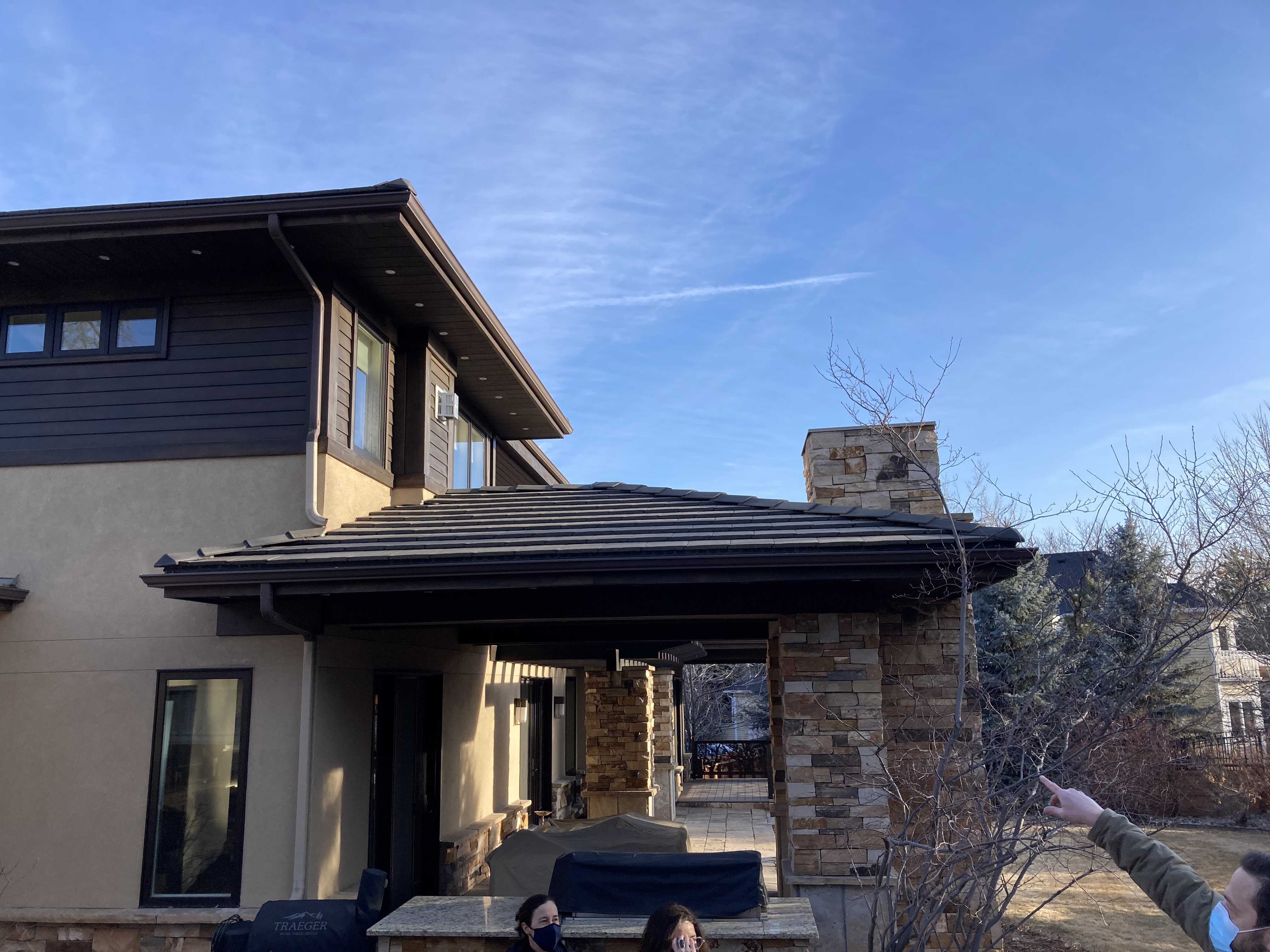 Rear exterior of Parkside Villa before renovation, illustrating the original relationship between the home and backyard before the redesign.