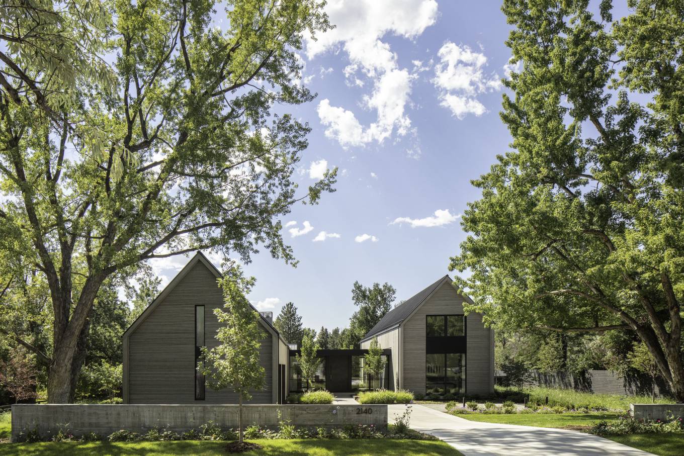 The Linden Grove residence is a modern interpretation of local agricultural and rural architecture, located on a large lot in a treelined neighborhood in Boulder.